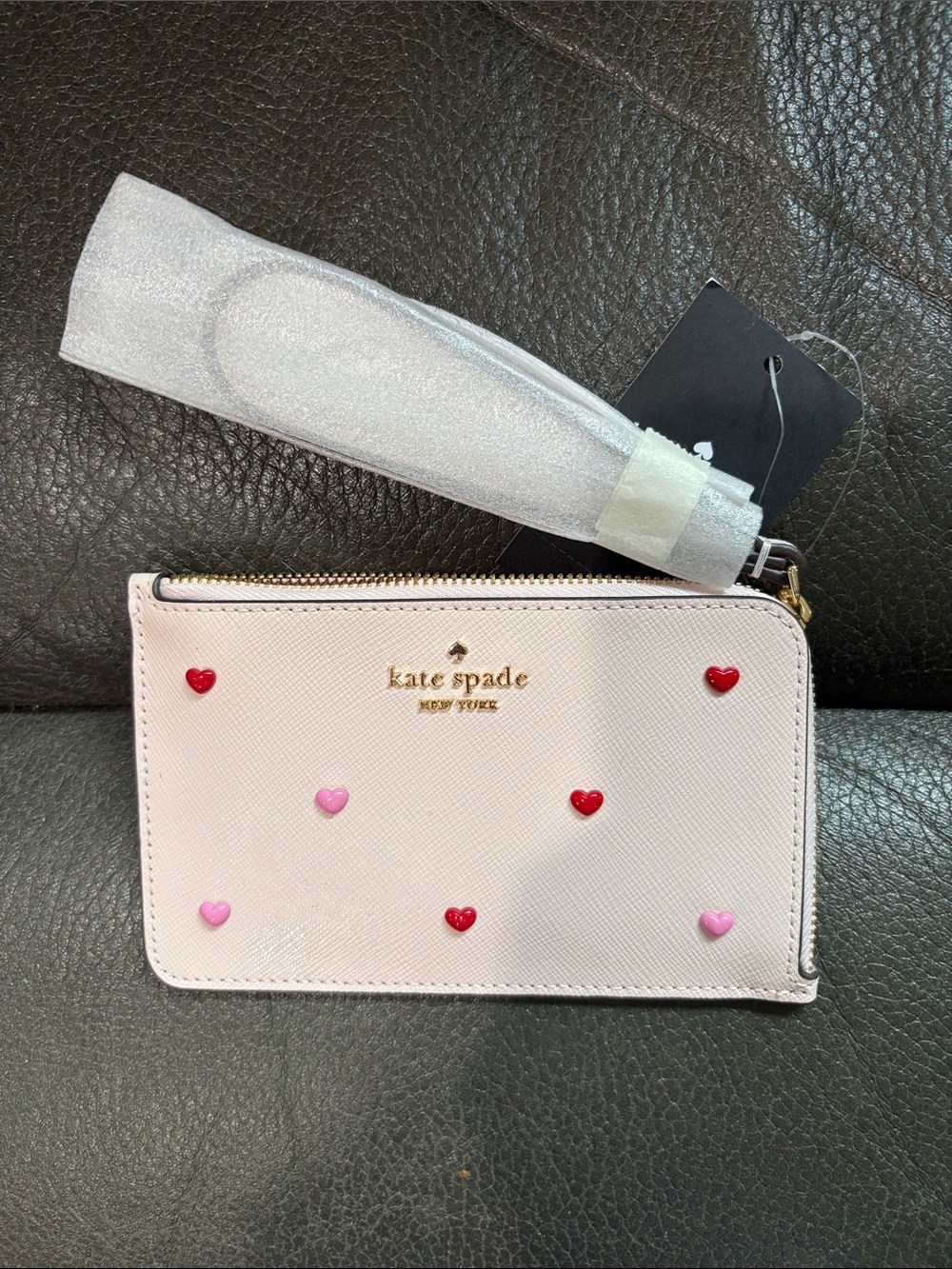 Kate spade small zip wristlet with heart studs